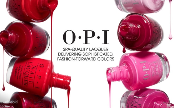 poi Bottles of pink and red nail polish pouring out surrounding the letters O P I.