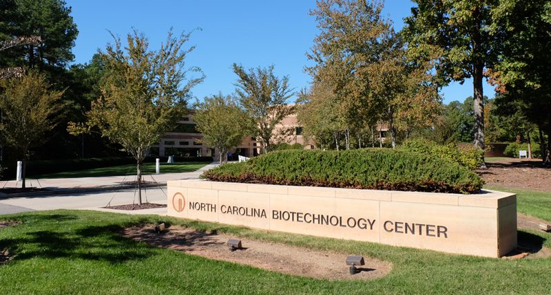 North Carolina Biotechnology Center name on a brick sign.