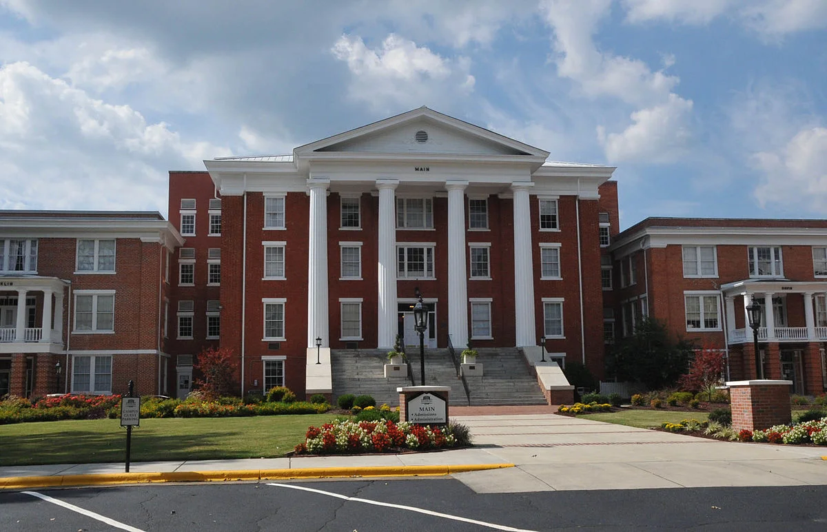 Main building of Louisburg College. The front of the building is lined with classic, tall columns.